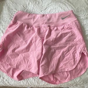 Pink Nike running shorts